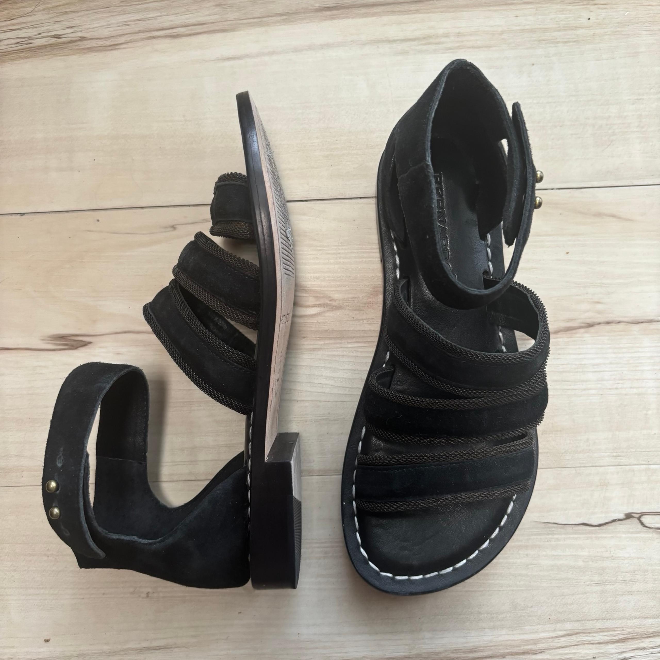 Step into comfort with Bernardo's black sandals, designed with wide leather-like