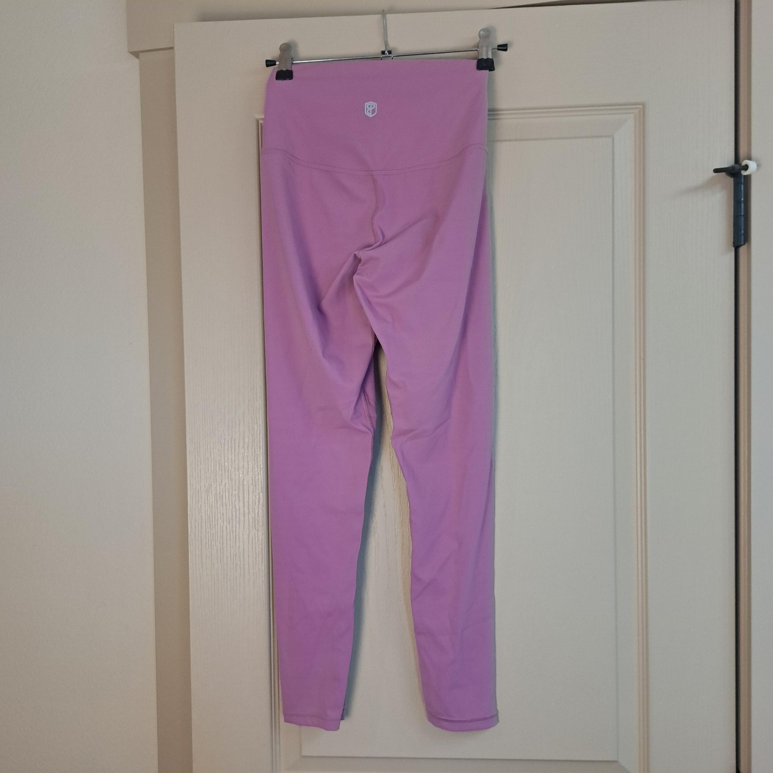 Womens small Born Primitive leggings size small purple/Pinkish color