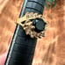 Size7 gold tone black and clear stone cocktail ring