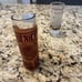 Vintage shot glass with a leather holder