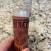Vintage shot glass with a leather holder