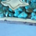 BELT BUCKLE NOCONA TURQOUISE SILVERTONE CROSS