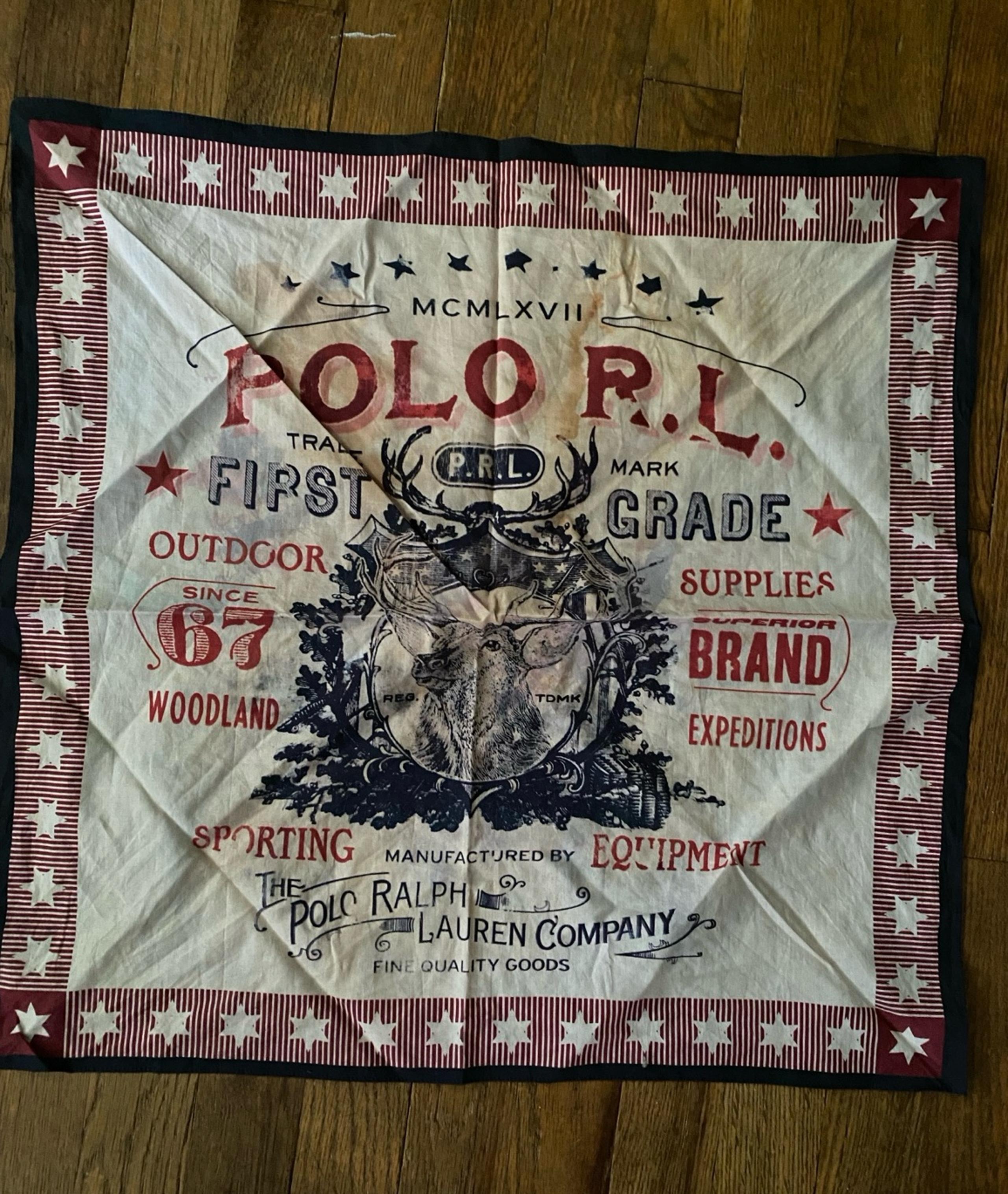The Ralph Lauren 20 inch, stained and faded handkerchief/bandana