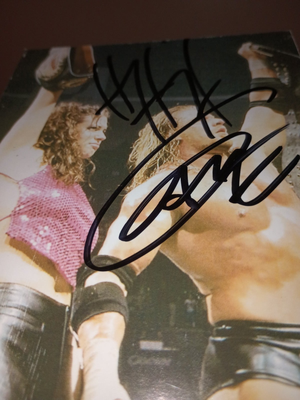 Autograph Photo by Triple H at 2000 WWFs WrestleMania with Stephanie.