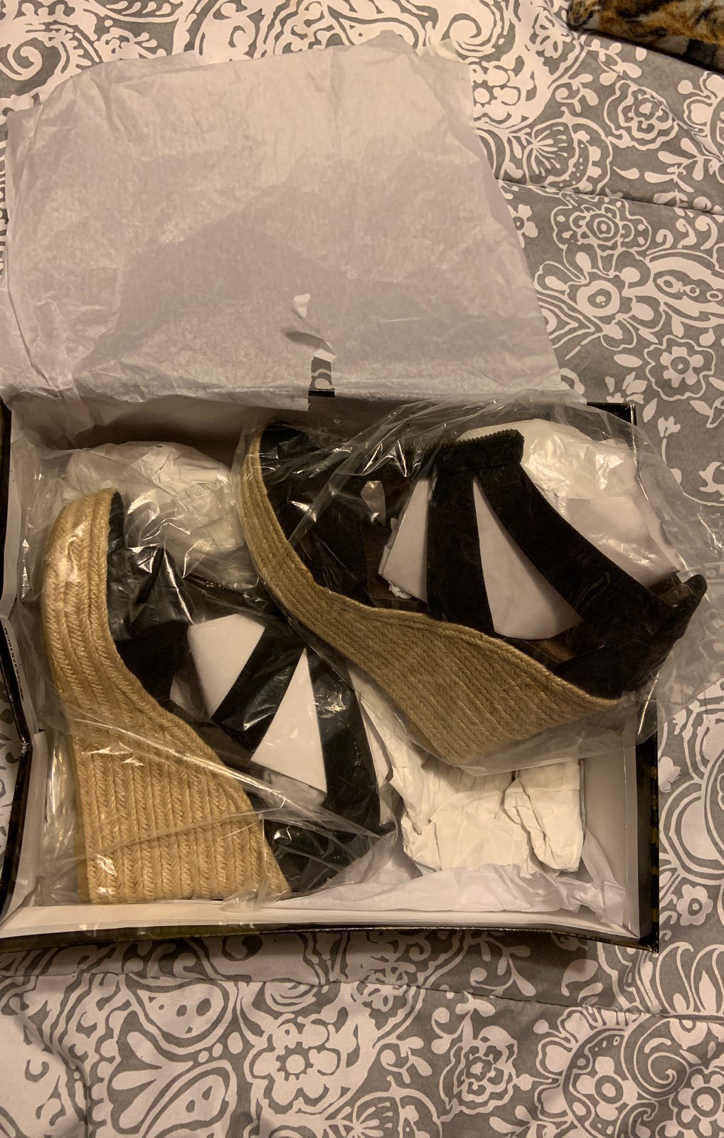 Pair of 7 1/2 black and beige wedges wit