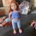 American girl and Our generation doll lo