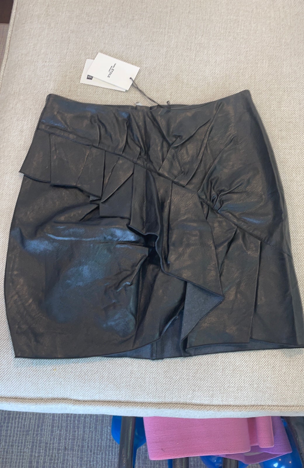 Black leather mini skirt