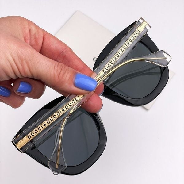 Gucci Seasonal Icon GG0564SN 001 Sunglasses Crystal Gold Black Cat Eye Women