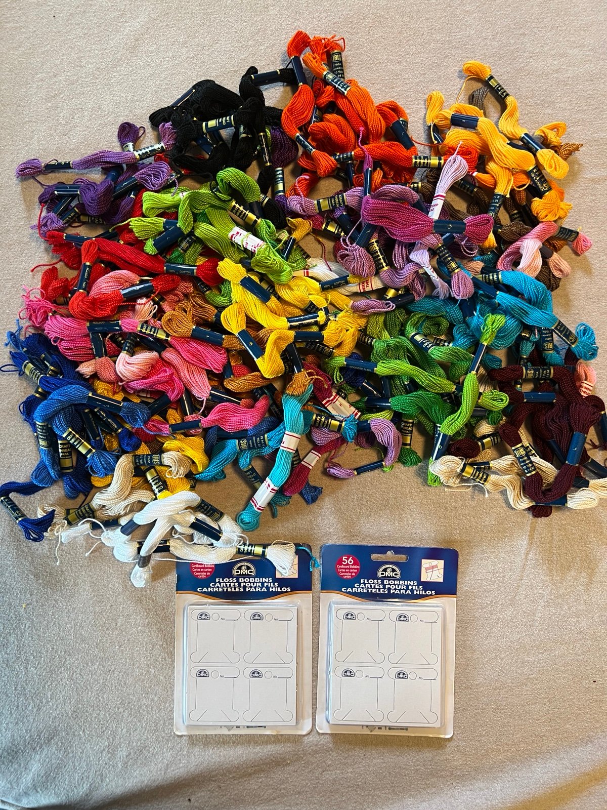 Iris craft thread lot and two DMC floss, bobbin packages