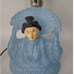 Cast iron head bobber,, novelty vanity lamps 1920's blue pyro glass lamps .