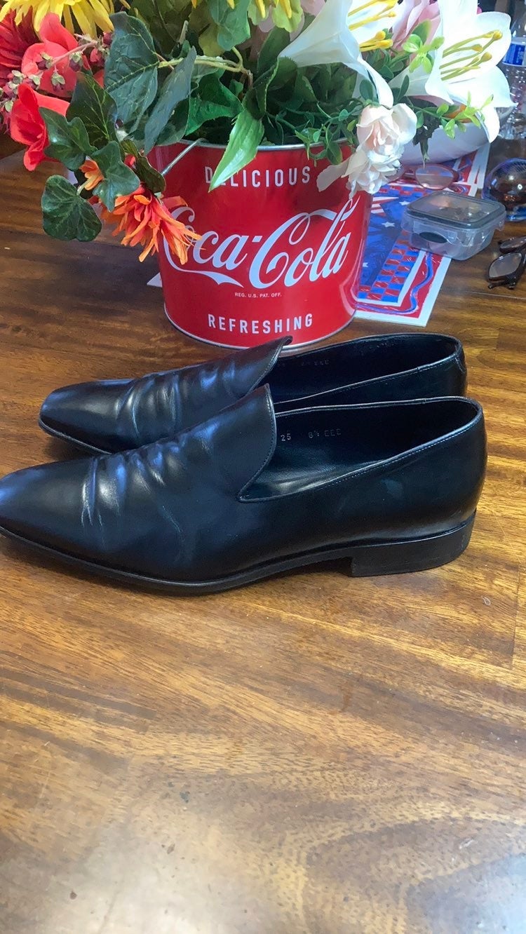 Vintage Salvatore Ferragamo black leather shoes.
