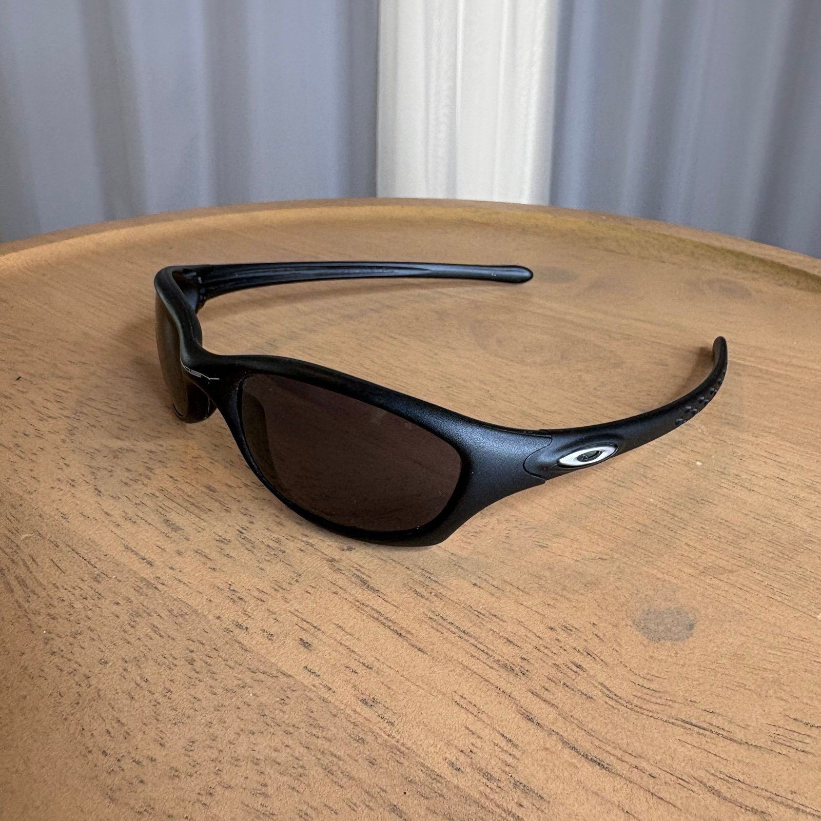 Kids Black Oakley sunglasses