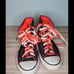 Neon orange and purple chuck taylors
