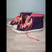 Neon orange and purple chuck taylors