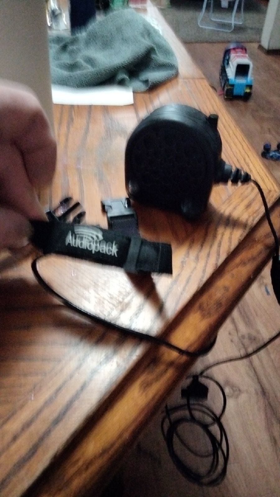 Audio pack has amp and throat Mic for underneath hazmat suits