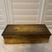 Vintage wood box covered in brass