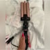 The beachwaver 3B curling iron