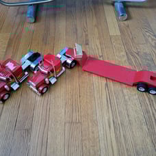 New Ray 1:32 Scale 379 Peterbilt with Lowboy Trailer Qty 2