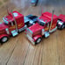 New Ray 1:32 Scale 379 Peterbilt with Lowboy Trailer Qty 2