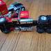 New Ray 1:32 Scale 379 Peterbilt with Lowboy Trailer Qty 2
