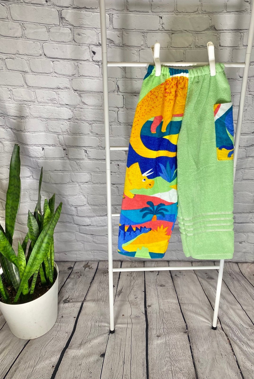 Towel pants green dinosaurs