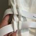Maniere de Voir Belted white high leg bodysuit