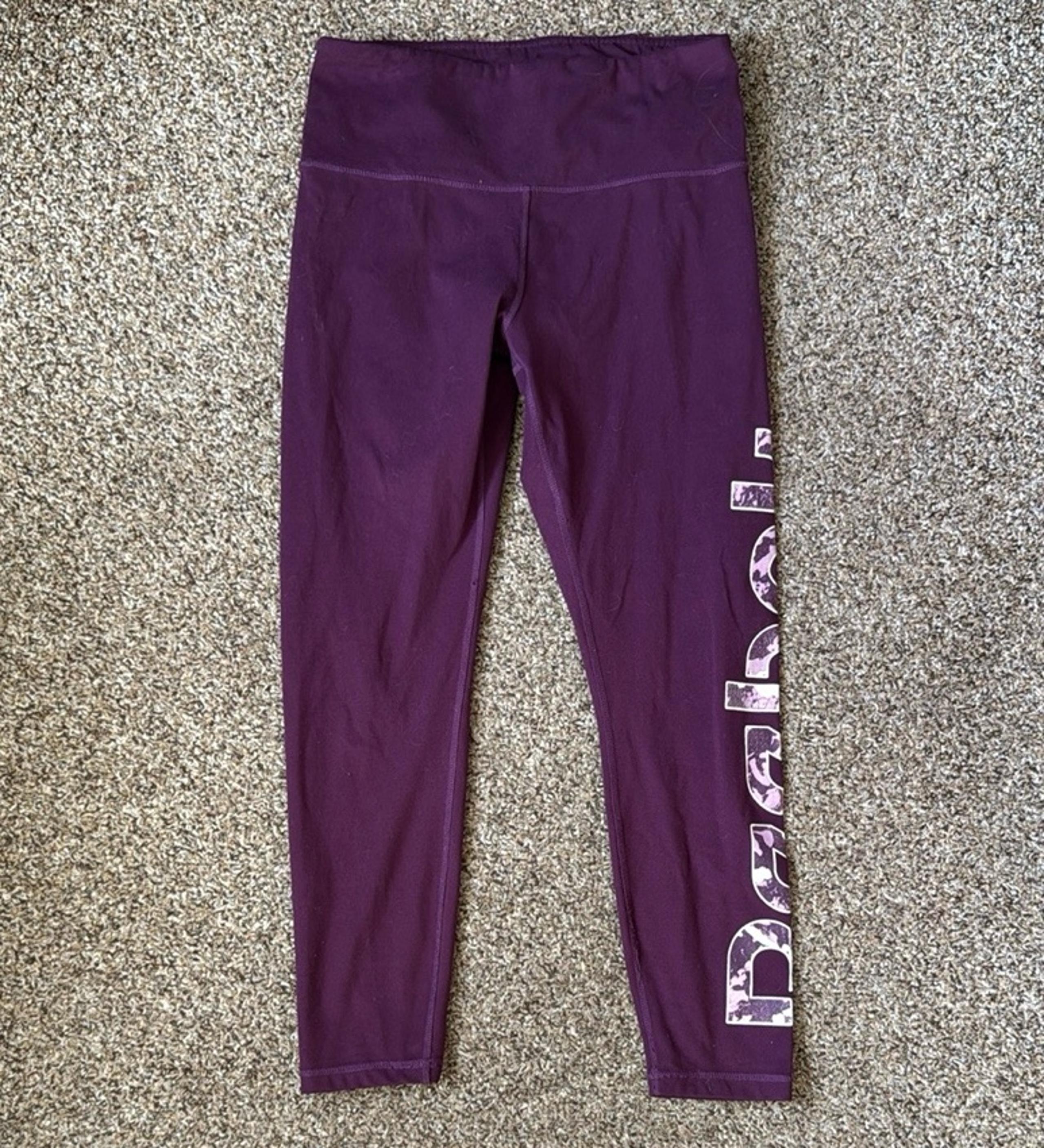 women’s Purple Athletic Leggings size medium - Reebok