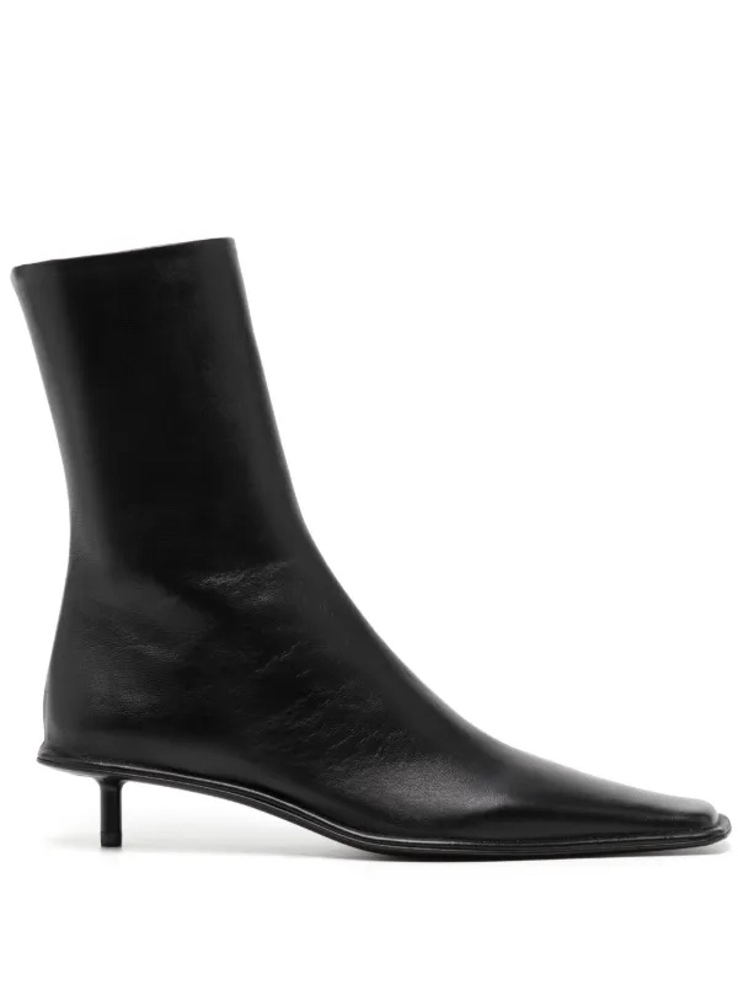 $1530 Jil Sander
25mm square-toe leather boots size 36