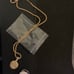 Preloved men’s Dior medallion necklace full inclusion