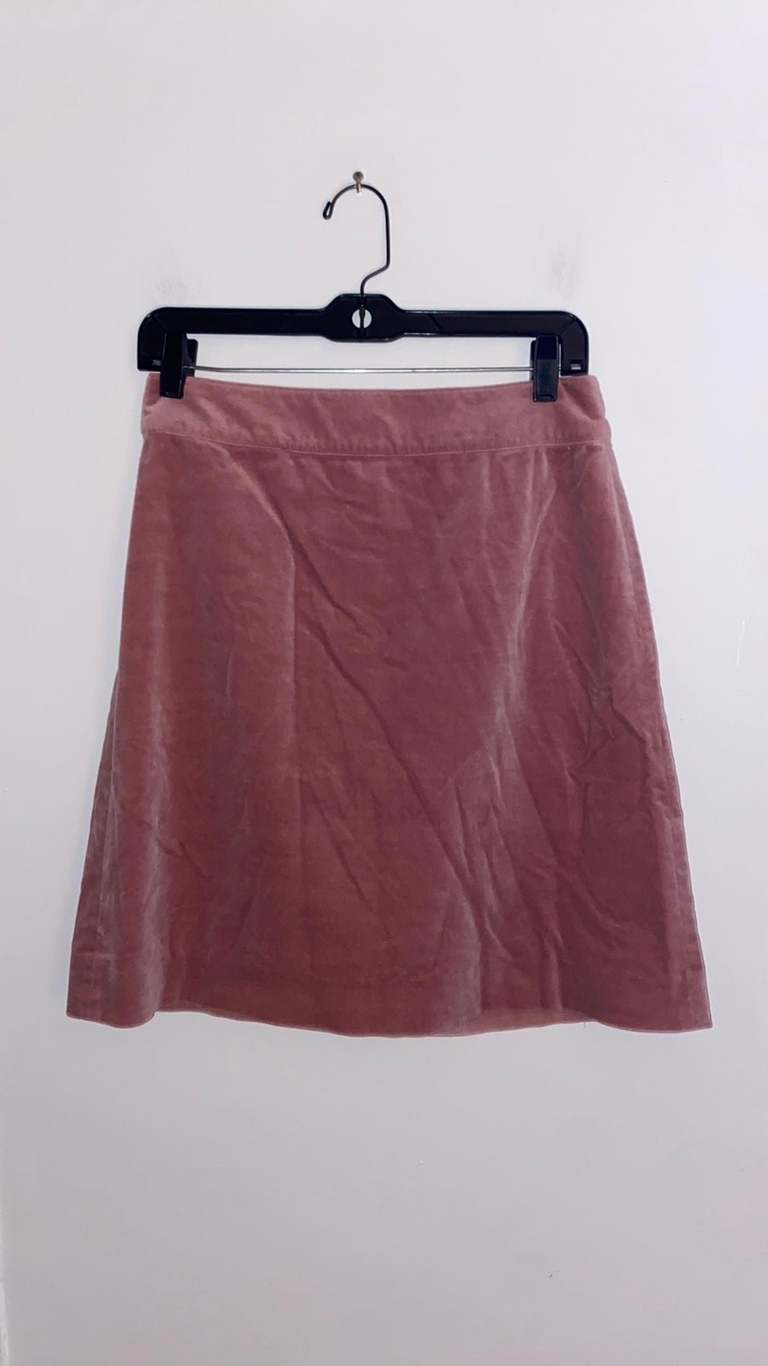 DKNY women’s blush colored mini skirt in a cotton/spandex velvet, zipper back, 4
