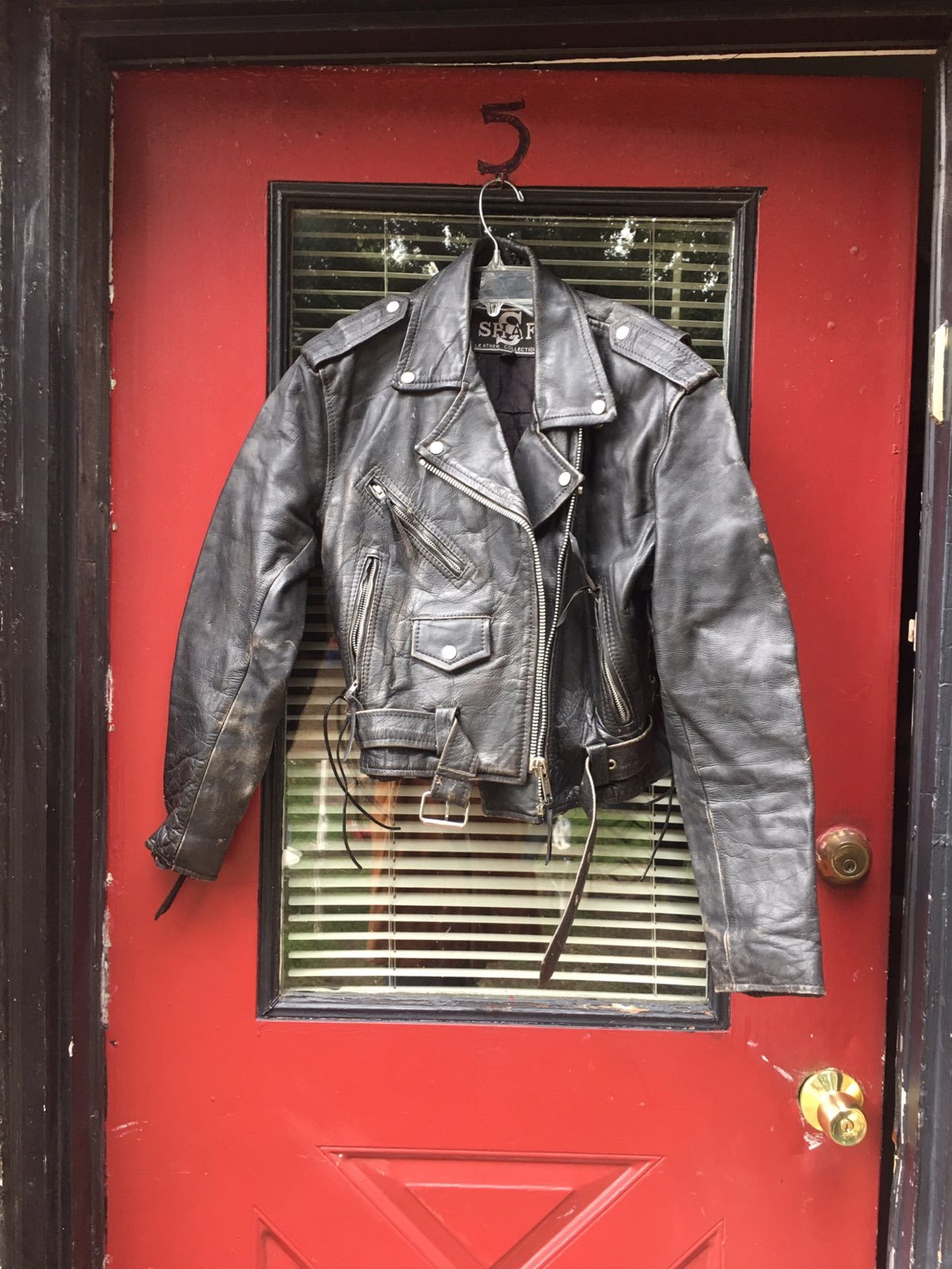 vintage Leather jacket. zippwrs on left