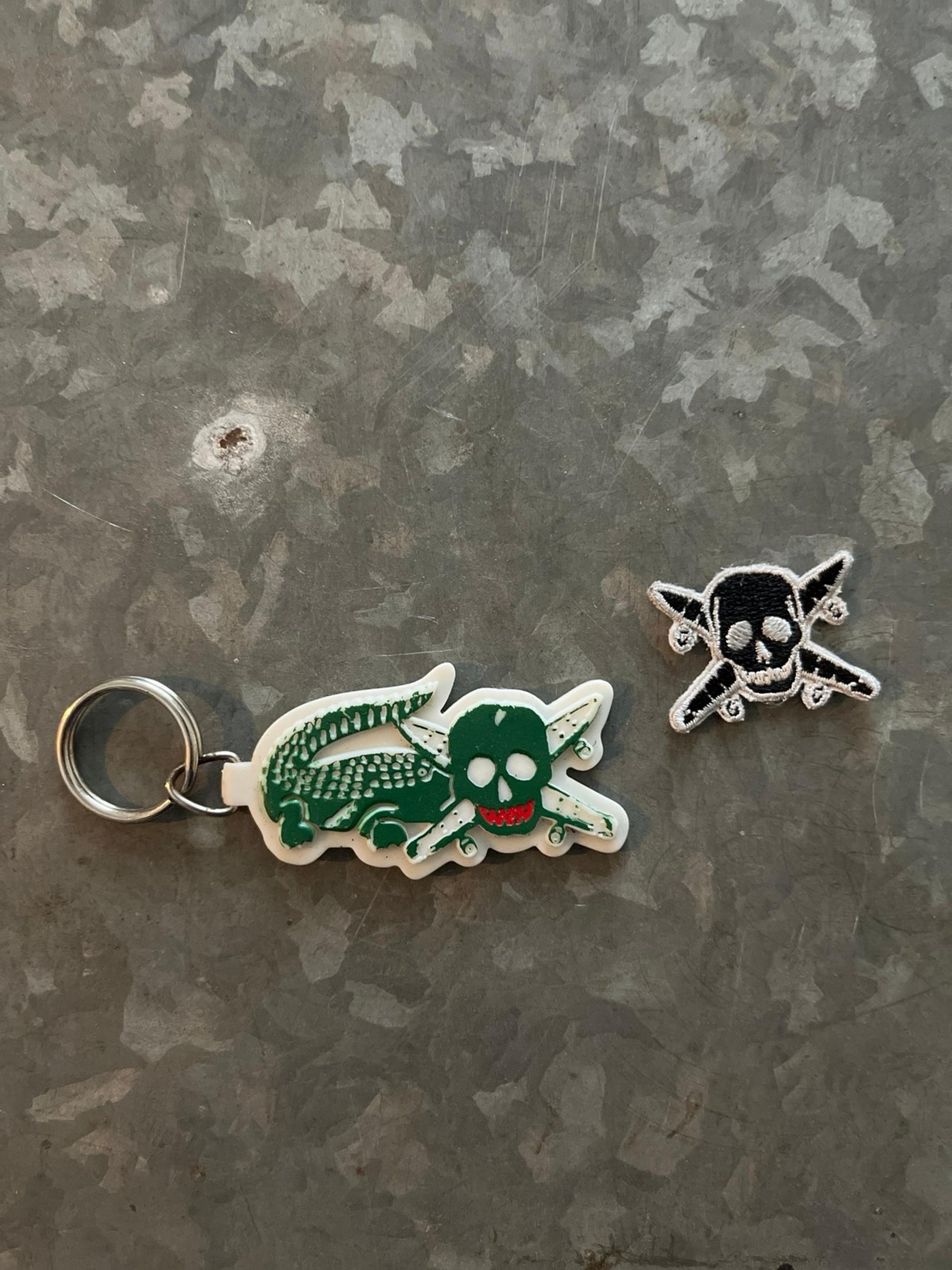 Fourstar key chain, sticker, and patch