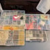 four organizers full of beads