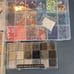 four organizers full of beads