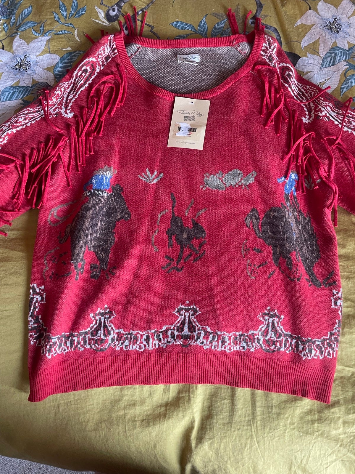 tasha polizzi sweater