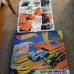 HOT WHEELS 30 FEET OF TRACK AND 2 CARS