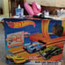 HOT WHEELS 30 FEET OF TRACK AND 2 CARS