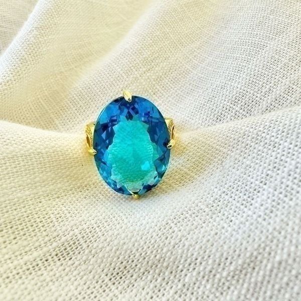 Bright blue oval cut cubic zirconia ring adjustable