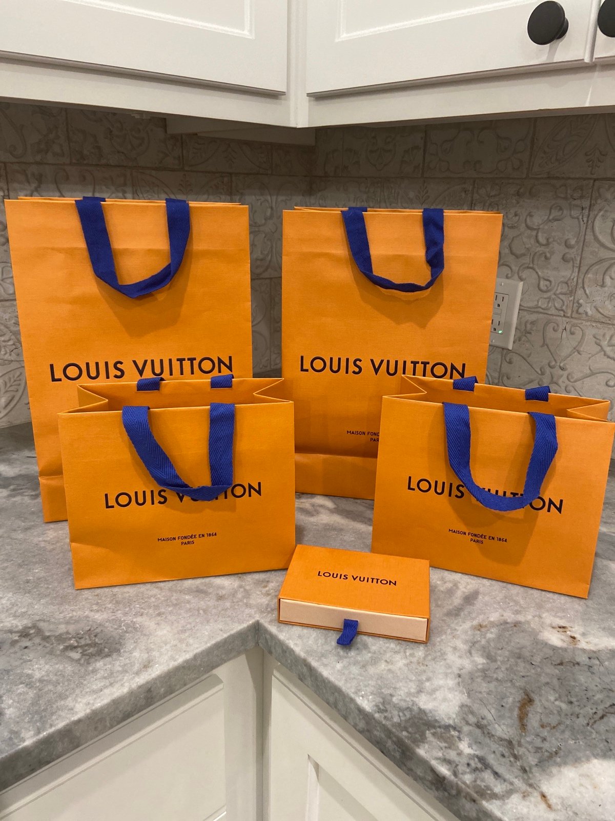 Louis Vuitton Shopping bags