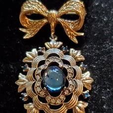 Gorgeous Golden Bow with Blue Stones