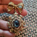 Gorgeous Golden Bow with Blue Stones