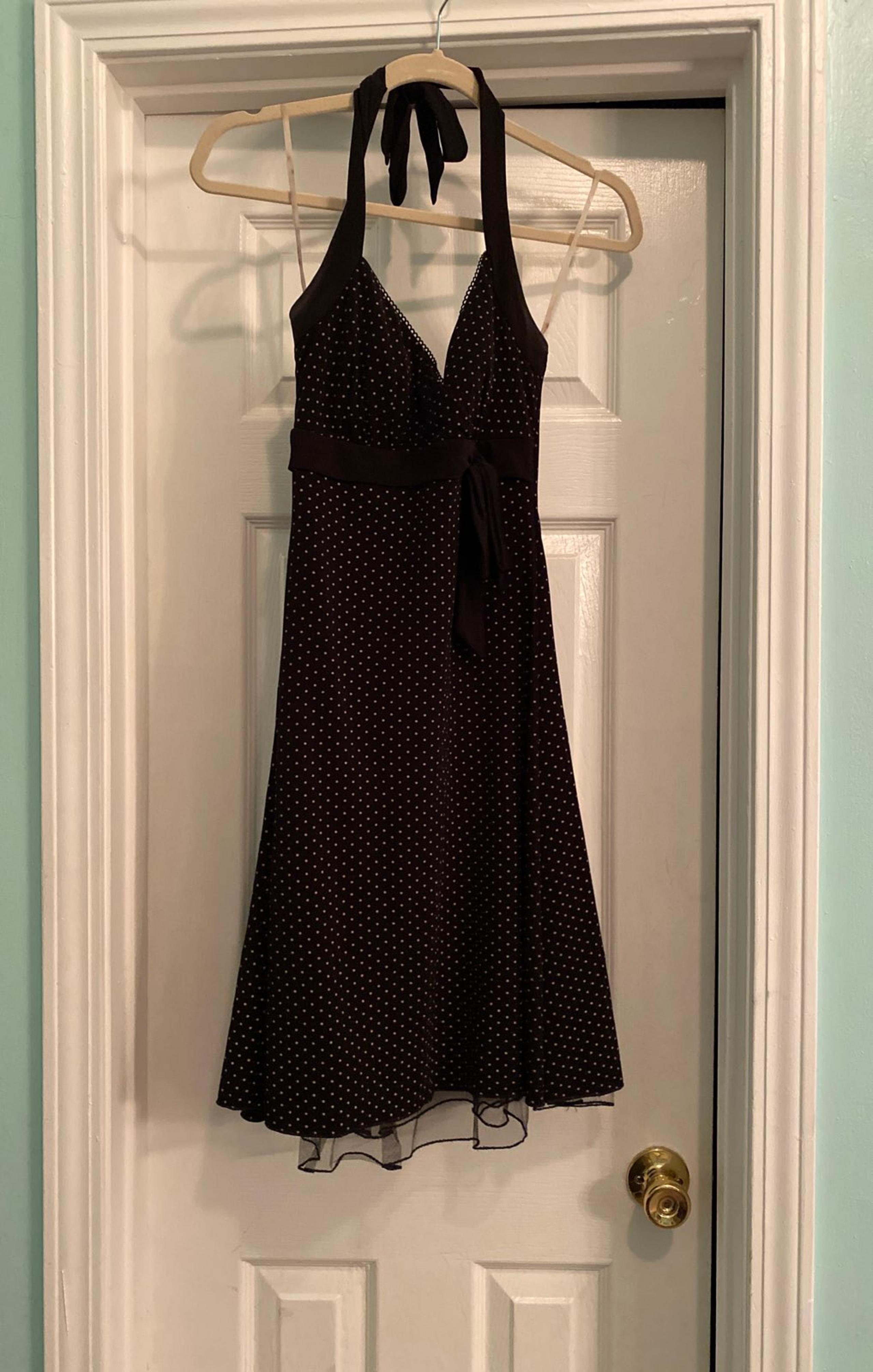 Black and white polka dot halter dress