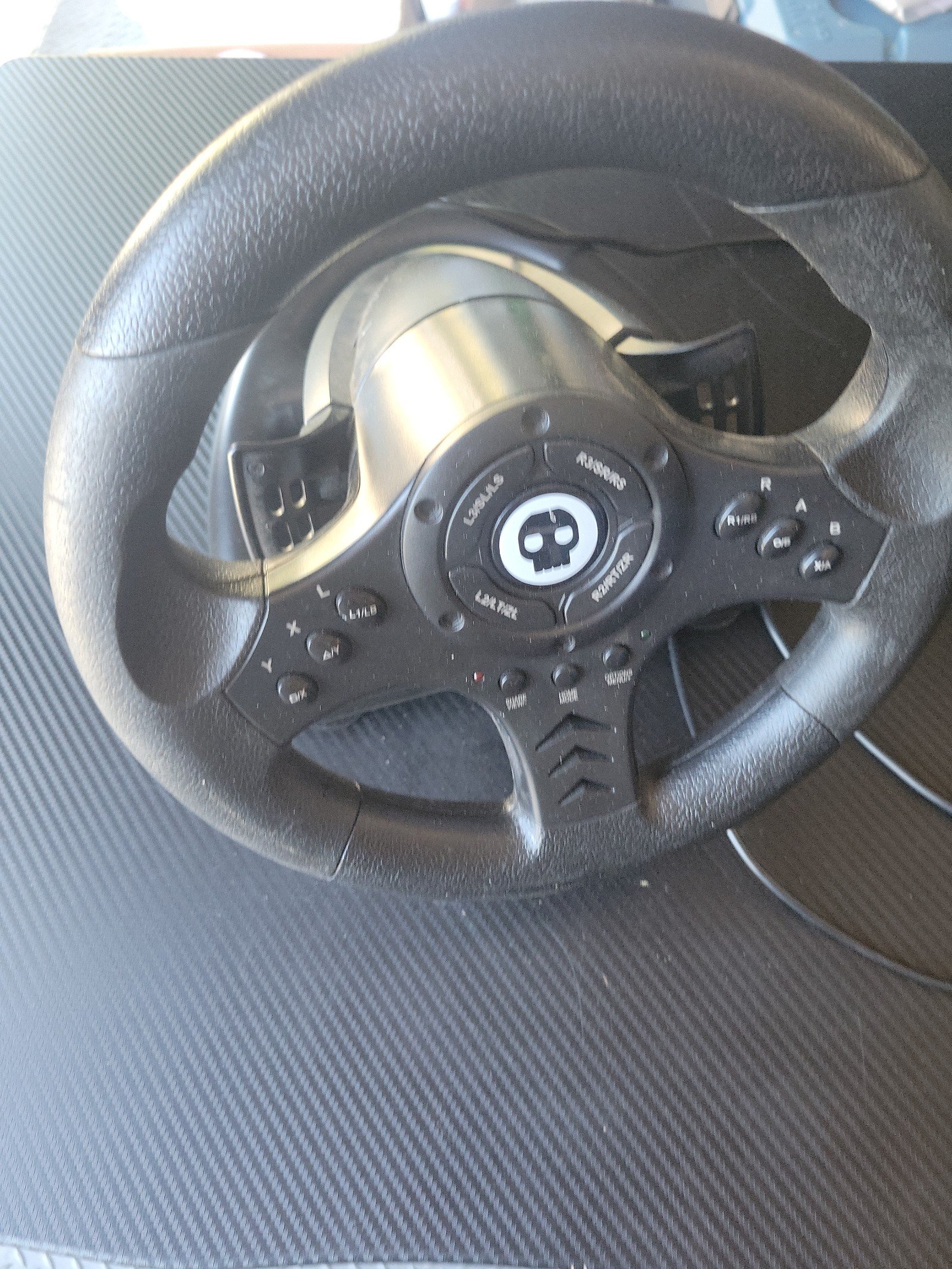 Numskull video game steering wheel and pedals