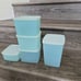Vintage Tupperware set of 5 various sizes with lids. Pastel blue 1960's