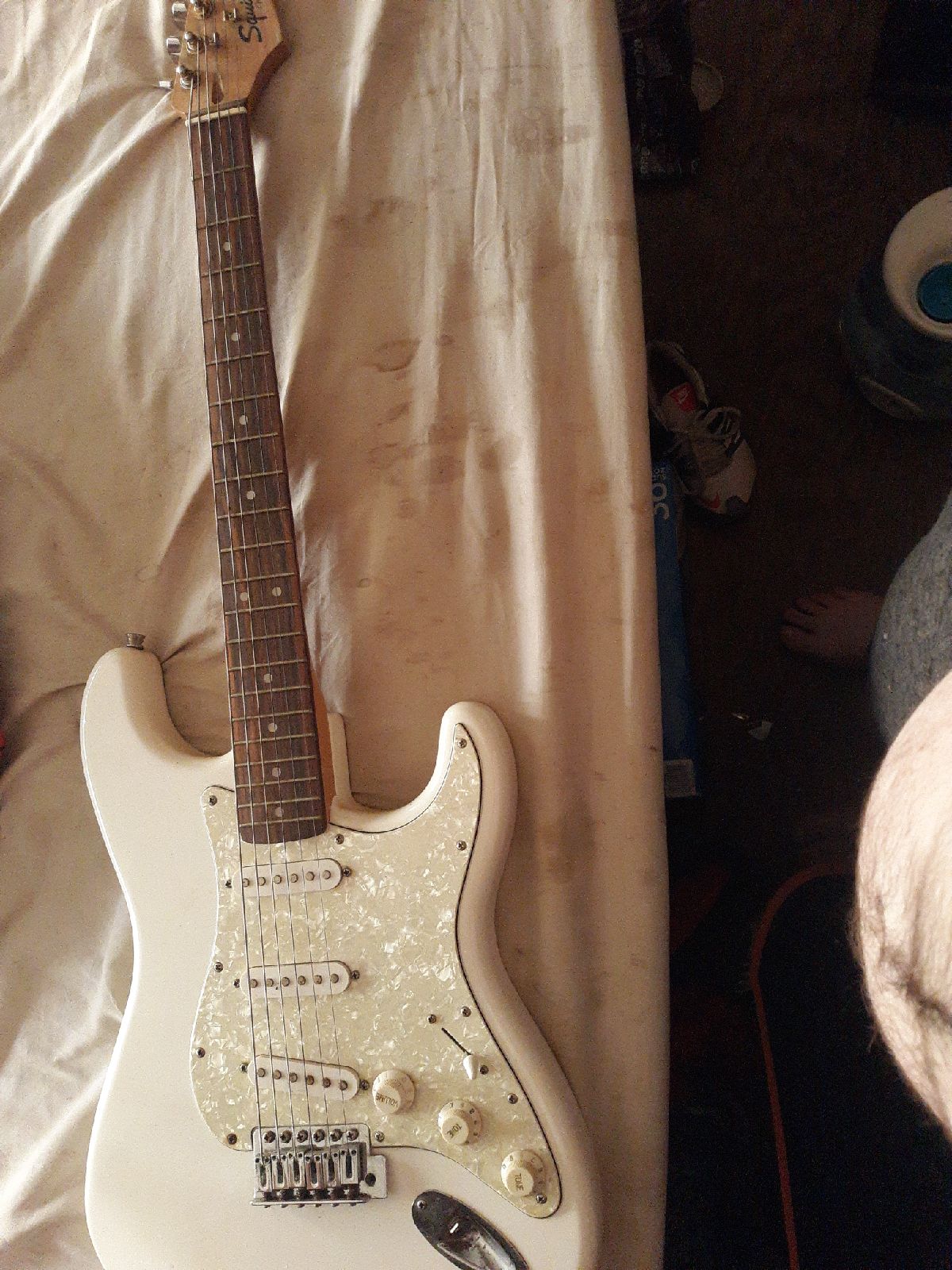 Fender stratocaster, California amp, Peavey acoustic guitar and hard case.