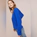 Anthropologie blue hooded sweater size medium