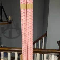 2 Rolls of pink with pink bow gift wrap