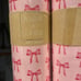 2 Rolls of pink with pink bow gift wrap