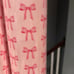 2 Rolls of pink with pink bow gift wrap