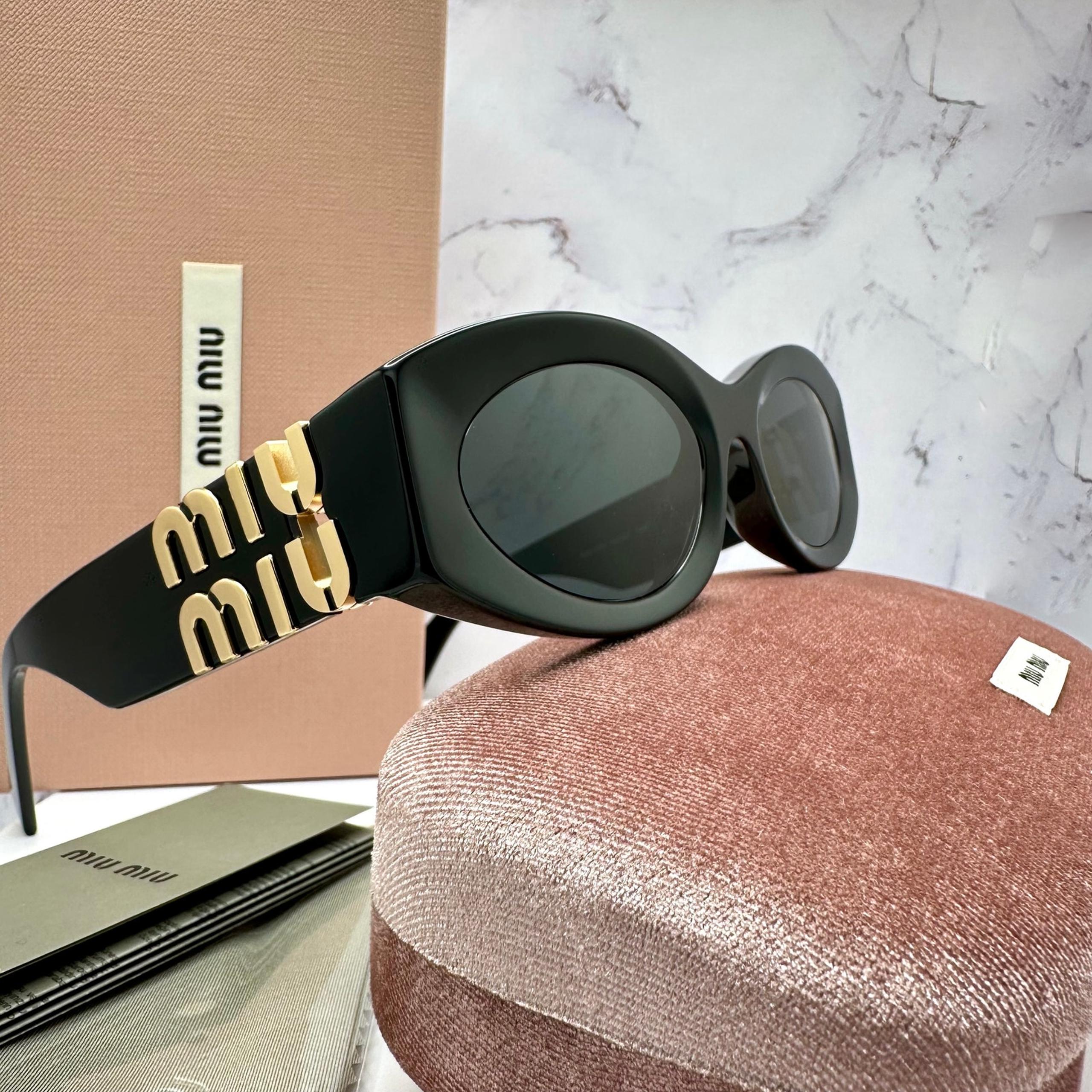 New MIU MIU Sunglasses Black Oval Acetate Gold Metal Logo Authentic Womens